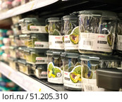 A row of plastic containers with the word "brilliant" on them.  Russia. Moscow. 24.08.25. Редакционное фото, фотограф Ярославский Максим / Фотобанк Лори