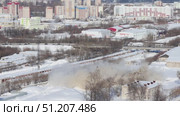 industrial demolition of a production building by blasting in the city center in winter. Стоковое видео, видеограф Алексей Сергеев / Фотобанк Лори