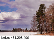 Winter's Embrace Over Frozen Lake in the Finnish Karelia Region. Стоковое фото, фотограф Aleksandr Golubev / Фотобанк Лори