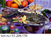 The food in the restaurant fish sturgeon on the tray. Стоковое фото, фотограф Наталия Кирсанова / Фотобанк Лори