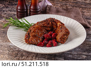 Baked pork sirloin with cornus. Стоковое фото, фотограф Андрей Старостин / Фотобанк Лори