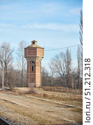 Dagestan, Russia. - January 06, 2024: An ancient water tower near the Sary-Kum dune. Редакционное фото, фотограф Наталия Кирсанова / Фотобанк Лори