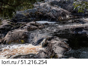Akhinkoski Waterfalls or Ruskeala Waterfalls on the Tohmajoki River. Russia, Republic of Karelia. Стоковое фото, фотограф Photojuli / Фотобанк Лори