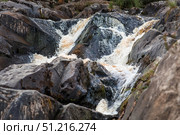 Akhinkoski Waterfalls or Ruskeala Waterfalls on the Tohmajoki River. Russia, Republic of Karelia. Стоковое фото, фотограф Photojuli / Фотобанк Лори