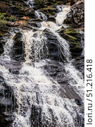 Yukankoski Waterfall (White Bridges) in the Republic of Karelia on a summer evening, Russia. Стоковое фото, фотограф Photojuli / Фотобанк Лори