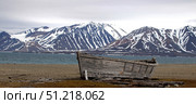 Forgotten whale hunting boat, Spitsbergen, Norway. Ofer Zidon / Stocktrek Images/TASS. Стоковое фото, агентство ТАСС / Фотобанк Лори