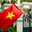 Red Vietnamese flag on the wall of a private house. National and patriotism concept. High quality photo. Copy space. Стоковое фото, фотограф Ирина Михайличенко / Фотобанк Лори