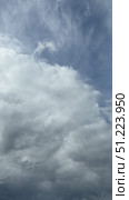 Cumulus clouds change in atmospheric space under the action of wind. Natural blue sky background. Scenic cloudscape. Weather forecast. Accelerated vertical video, time-lapse. Стоковое видео, видеограф Виктория Катьянова / Фотобанк Лори