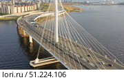 Aerial view of cable-stayed bridge with cars. Стоковое фото, фотограф Михаил Коханчиков / Фотобанк Лори