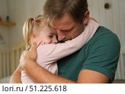 Happy Father Playing with Daughter. Three Years Baby Smiling, Laughing, Looking at Daddy. Man Showing Affection to Child. Candid Real Emotion. Beard Dad and Little Kid Girl. Authentic Family Lifestyle. Стоковое фото, фотограф Марина Демидюк / Фотобанк Лори