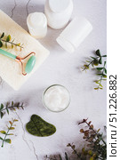 Moisturizing cream with beef tallow in a jar on the table top and vertical view. Стоковое фото, фотограф Елена Руй / Фотобанк Лори