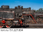 An old Soviet steam locomotive of the L series. The Ruskeala Express retro train is at the Sortavala station. Russia, Republic of Karelia, Sortavala, August 12, 2025. Редакционное фото, фотограф Photojuli / Фотобанк Лори