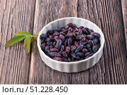 Sweet juicy ripe honeysuckle berries. Стоковое фото, фотограф Андрей Старостин / Фотобанк Лори