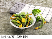 Raw gherkin cucumbers in the bowl. Стоковое фото, фотограф Андрей Старостин / Фотобанк Лори