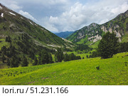 Distant sunny mountain valley. Summertime. Стоковое фото, фотограф Саблин Станислав / Фотобанк Лори
