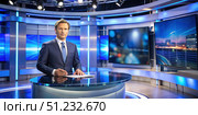 Male News Anchor Delivering Broadcast in Modern Studio. Generative AI. Стоковое AI-изображение, AI-художник Roman Zavorotny / Фотобанк Лори