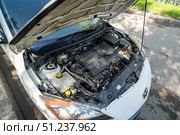 KRASNOYARSK, RUSSIA - August 19, 2025: White Mazda Axela. Редакционное фото, фотограф Плотников Дмитрий / Фотобанк Лори