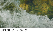 Closeup of splashing river water with visible reflection and motion in Croatia. Стоковое видео, видеограф Ольга Сухарева / Фотобанк Лори
