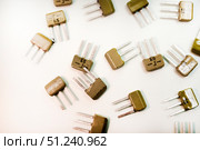 Bipolar transistors on a white background. Semiconductor devices. Microelectronics. Стоковое фото, фотограф Valeriy Lushchikov / Фотобанк Лори