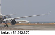 Finnair passenger plane taxiing, rear view. Редакционное видео, видеограф Игорь Жоров / Фотобанк Лори