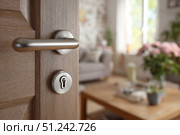 Doorknob. Metal door handle lock and latch of chrome on veneer doors. Door wooden half opening through cozy living room interior background, selective focus. Modern trends of interior design. Close-up. Стоковое AI-изображение, AI-художник Марина Демидюк / Фотобанк Лори