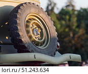 Classic Off-Road Vehicle Spare Tire Mounted on Rear. Редакционное фото, фотограф Sergakoff / Фотобанк Лори