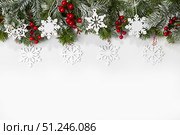 Christmas card with fir branches and Christmas decorations. Стоковое фото, фотограф Ирина Толокновская / Фотобанк Лори