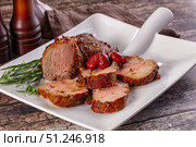 Baked pork sirloin with cornus. Стоковое фото, фотограф Андрей Старостин / Фотобанк Лори