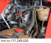 Vintage Fiat 500 C Sport 1952 Red Car Engine Restoration Detail (2024 год). Редакционное фото, фотограф Sergakoff / Фотобанк Лори