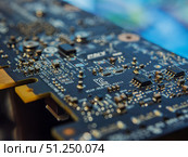High-Resolution Close-Up of a Graphics Card PCB. Редакционное фото, фотограф Sergakoff / Фотобанк Лори