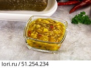 Souce gherkin relish with marinated cucumbers. Стоковое фото, фотограф Андрей Старостин / Фотобанк Лори