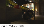 Experience nighttime fun with an illuminated slide in the city. Стоковое видео, видеограф Cantemir Dumitru / Фотобанк Лори