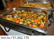 Delicious vegetable pan at the wedding. Стоковое фото, фотограф Sergakoff / Фотобанк Лори