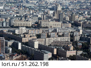 Вид на многоэтажные высотки у МИДа с высоты зданий Москва-Сити. Редакционное фото, фотограф Дмитрий Неумоин / Фотобанк Лори