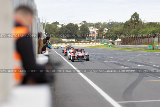 11-20-2022 PORTUGAL, LISBON: Caterham Festival Estoril - racing karts drive in a row along the race track. Редакционное фото, фотограф Константин Шишкин / Фотобанк Лори