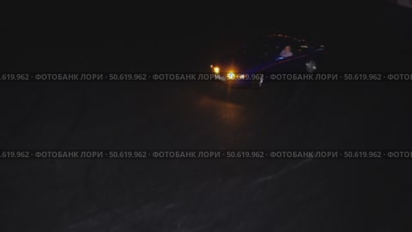 A blue car skids through the drift area. Стоковое видео, видеограф Ярославский Максим / Фотобанк Лори