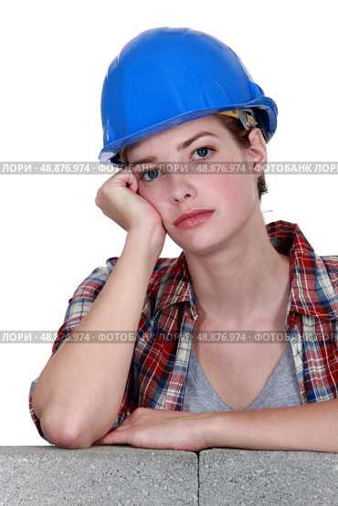 A bored tradeswoman. Стоковое фото, агентство Ingram Publishing / Фотобанк Лори