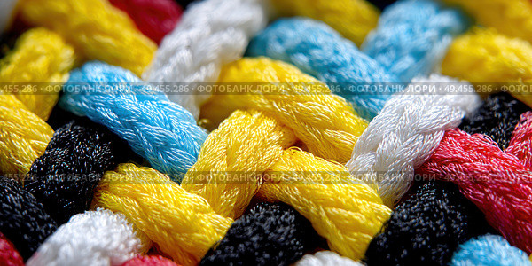 A colorful piece of fabric with a pattern of different colored strings. Стоковое AI-изображение, AI-художник Ярославский Максим / Фотобанк Лори