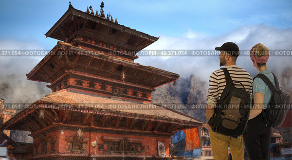 a couple of tourists travel around the city of Kathmandu. Nepal. Стоковое фото, агентство Ingram Publishing / Фотобанк Лори