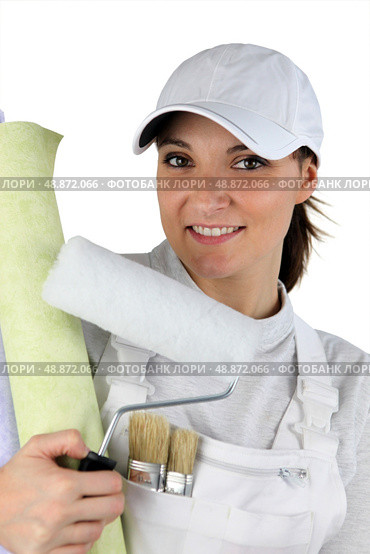 a female house painter. Стоковое фото, агентство Ingram Publishing / Фотобанк Лори