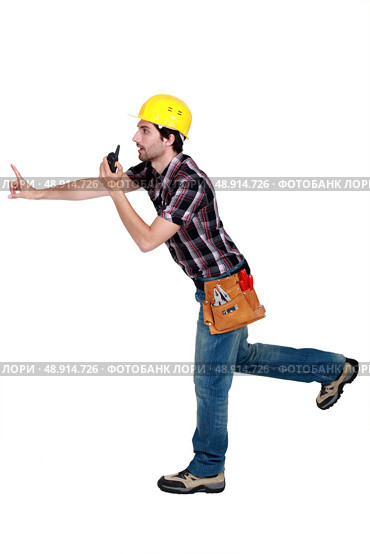 A foreman trying to prevent something bad from happening. Стоковое фото, агентство Ingram Publishing / Фотобанк Лори