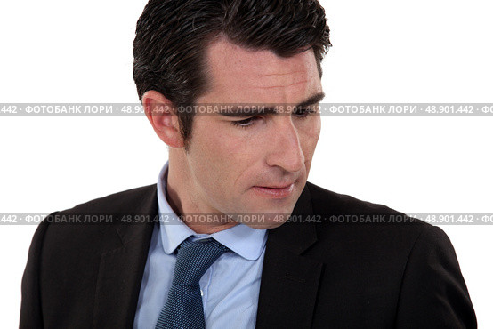 A frowning businessman. Стоковое фото, агентство Ingram Publishing / Фотобанк Лори
