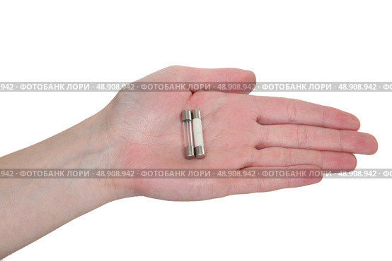 A hand holding fuses. Стоковое фото, агентство Ingram Publishing / Фотобанк Лори