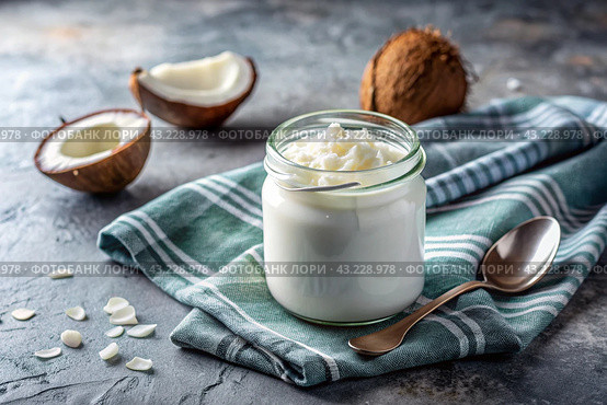 A healthy, healthy breakfast. Homemade vanilla, coconut yogurt with fresh coconut, vintage spoon and towel on a stylish gray background. Стоковое AI-изображение, AI-художник Photojuli / Фотобанк Лори