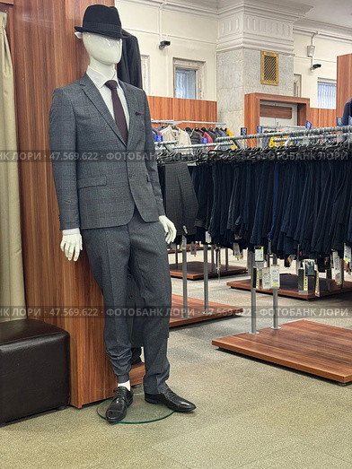 A male mannequin in the outerwear department at GUM. Редакционное фото, фотограф Vadzim Yakubovich / Фотобанк Лори