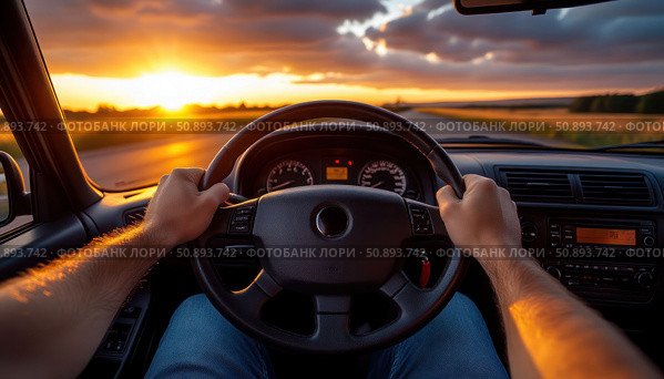 A man is driving a car with the sun setting in the background. Стоковое AI-изображение, AI-художник Ярославский Максим / Фотобанк Лори