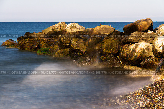 A pile of boulders in the sea. Стоковое фото, фотограф Андрей Ситников / Фотобанк Лори