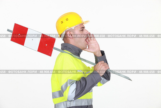 A road worker shouting instructions. Стоковое фото, агентство Ingram Publishing / Фотобанк Лори