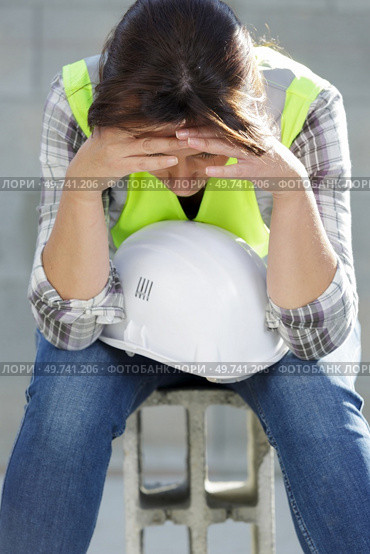 a stressed engineer construction worker. Стоковое фото, агентство Ingram Publishing / Фотобанк Лори