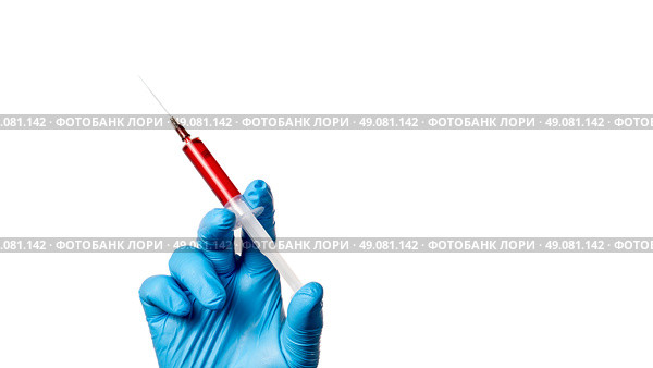 A syringe containing blood in the physician's grasp, a blood test for the virus. The virus that causes smallpox. The background is white, and the virus is isolated. Стоковое фото, фотограф Скрипачев Антон / Фотобанк Лори